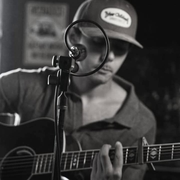 Cash Langford performing acoustic music in North Florida